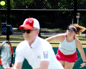 020219 RH 042 Tennis Erin Connolly Whyte serves Mike Kerr at the net web